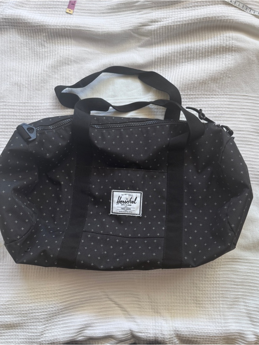 Herschel Sutton duffel bag Swiss cross pattern